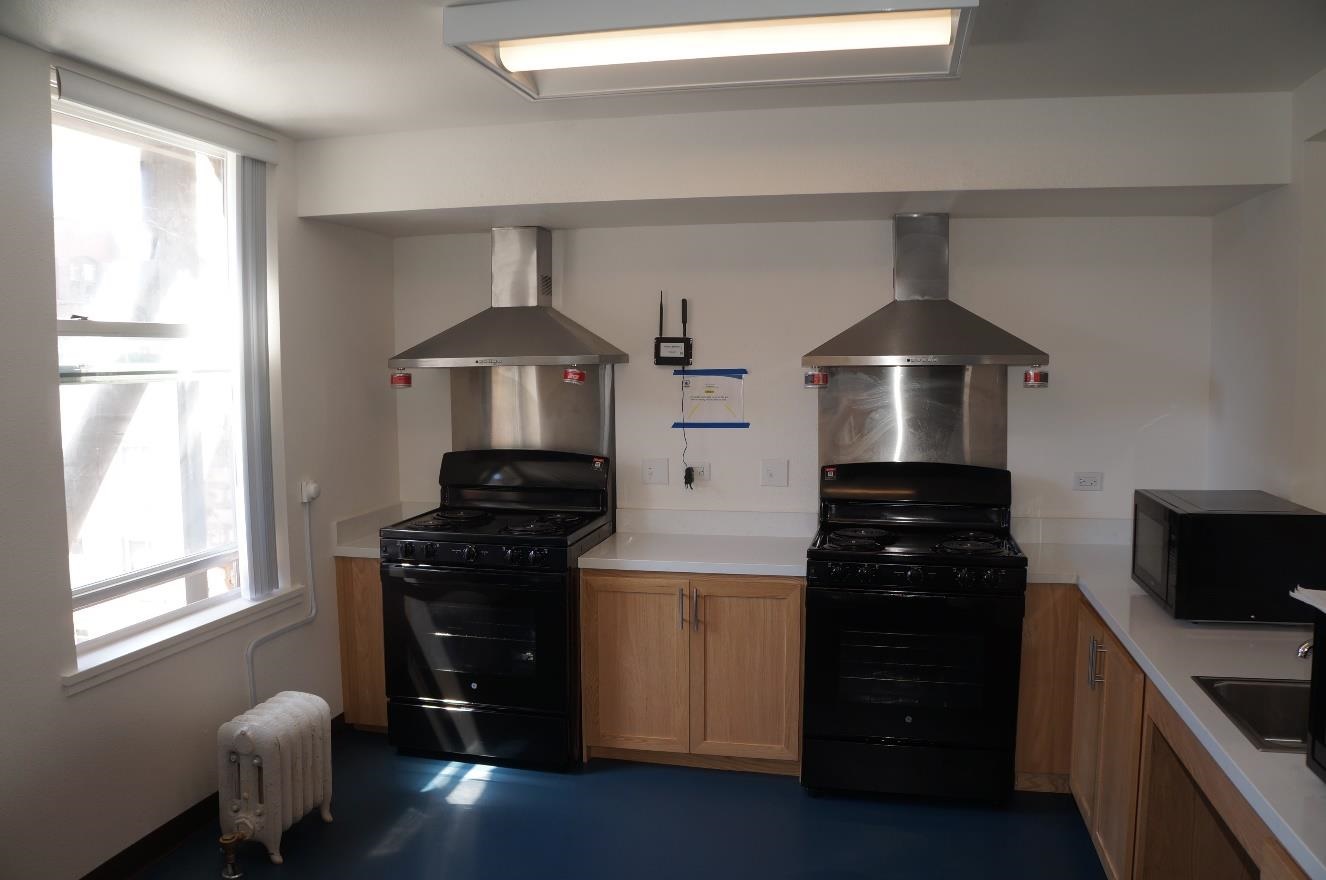 Sixth floor kitchen, added oven and new hood vents and stovetop fire suppressors